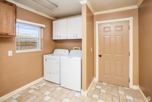 3356 W 1200 S, Ogden, UT 84404 - clothes washing area with washing machine and dryer, baseboards, crown molding, and cabinet space