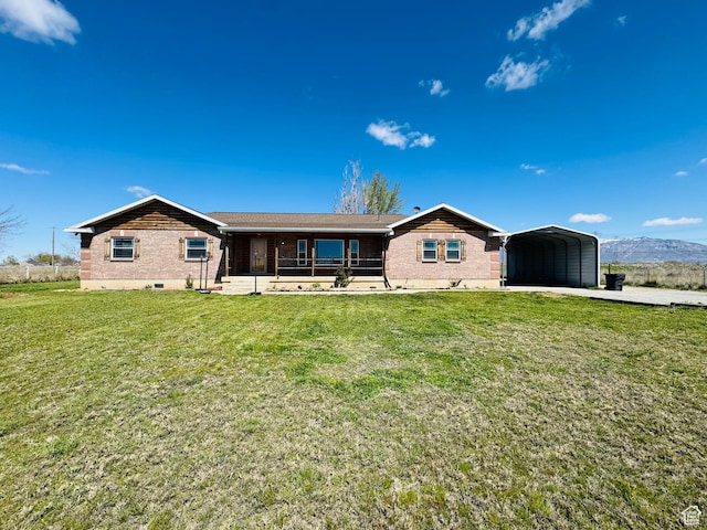 3356 W 1200 S, Ogden, UT 84404 - view of front of home with a carport, covered porch, brick siding, and a front yard