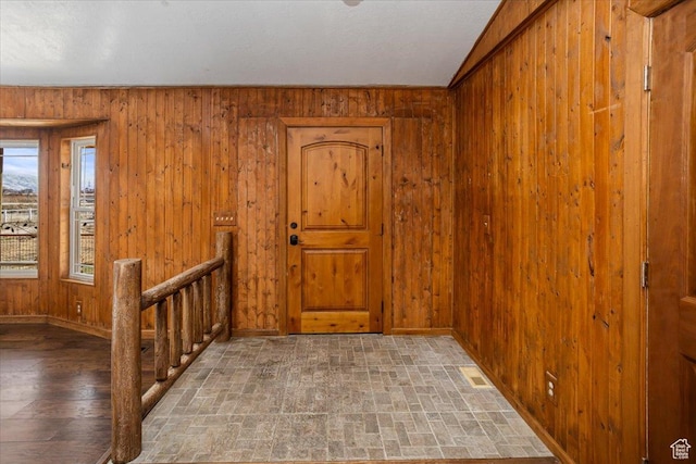 3356 W 1200 S, Ogden, UT 84404 - entrance foyer with brick patterned floor, wood walls, and baseboards