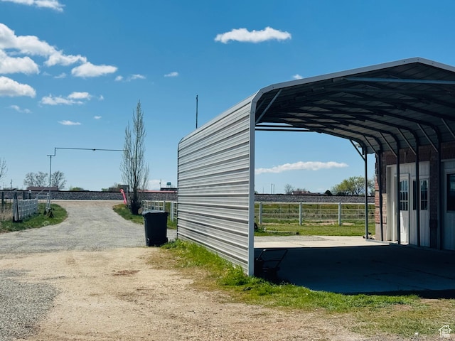 3356 W 1200 S, Ogden, UT 84404 - exterior space with fence, driveway, and a detached carport