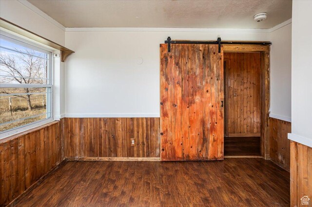 3356 W 1200 S, Ogden, UT 84404 - spare room with wooden walls, wood finished floors, and a wainscoted wall