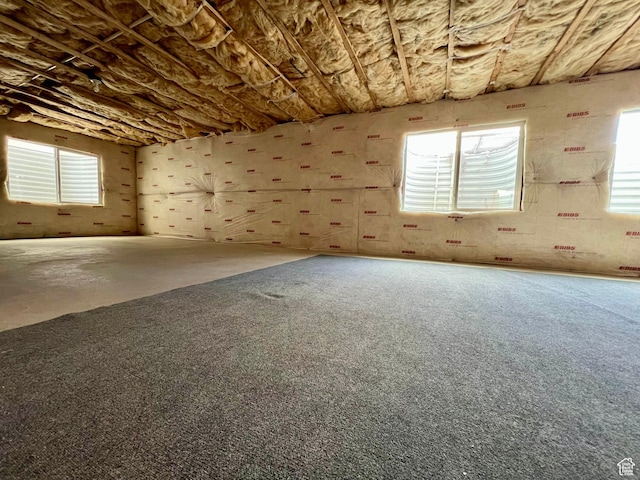 unfurnished room featuring a wealth of natural light