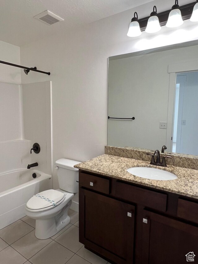 bathroom featuring vanity, visible vents, tile patterned flooring, bathtub / shower combination, and toilet