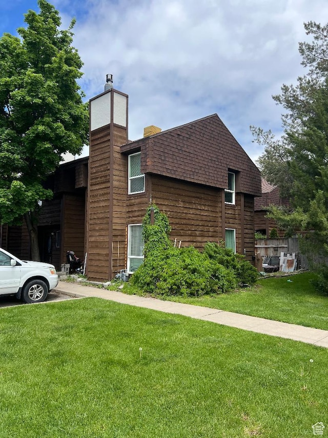 367 W 1100 N, Logan, UT 84341 - view of property exterior with a chimney