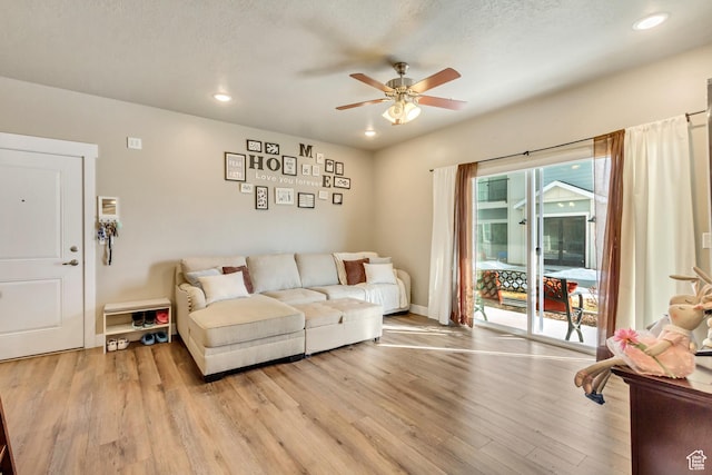 1128 S 820 E Unit 6104, Heber City, UT 84032 - living room featuring recessed lighting, light wood-type flooring, a textured ceiling, and ceiling fan