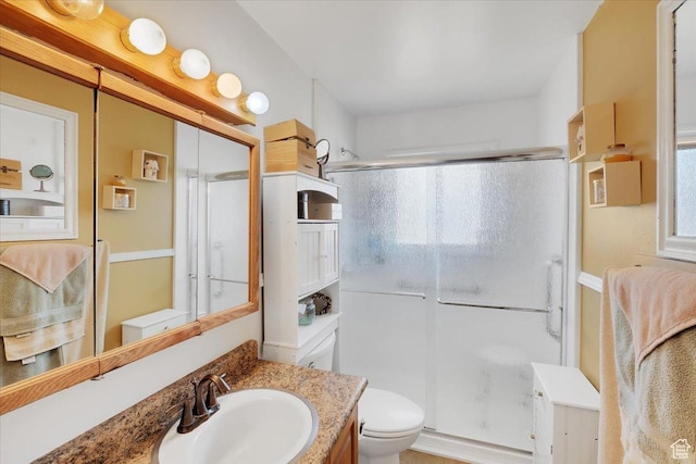 1564 N 1600 E, Logan, UT 84341 - full bath featuring a shower stall, toilet, and vanity