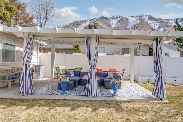 1564 N 1600 E, Logan, UT 84341 - view of patio with an outdoor living space, fence, and a mountain view
