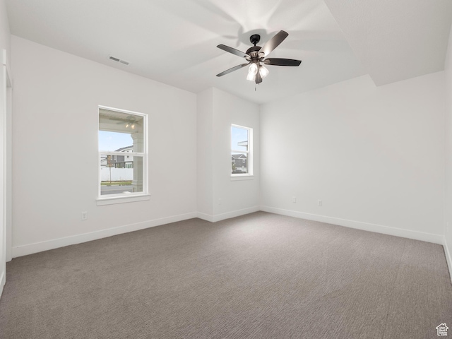 804 W 900 S, Springville, UT 84663 - unfurnished room with a wealth of natural light, baseboards, a ceiling fan, and carpet flooring