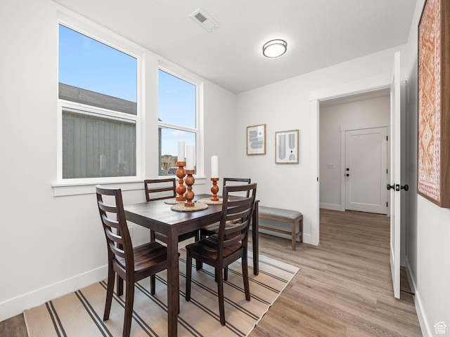 804 W 900 S, Springville, UT 84663 - dining area with baseboards, visible vents, and light wood finished floors