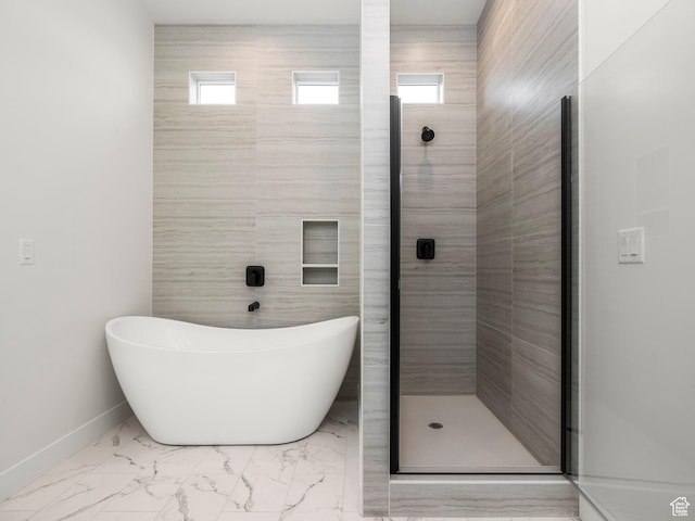 804 W 900 S, Springville, UT 84663 - bathroom with a shower stall, baseboards, a wealth of natural light, a soaking tub, and marble finish floor