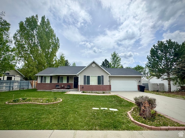 840 E 170 N, Heber City, UT 84032 - single story home featuring brick siding, concrete driveway, a garage, and covered porch