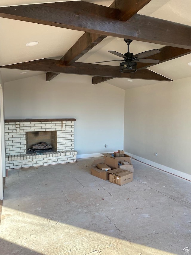 525 S 75 W, Providence, UT 84332 - unfurnished living room with a ceiling fan, vaulted ceiling with beams, a fireplace, and baseboards