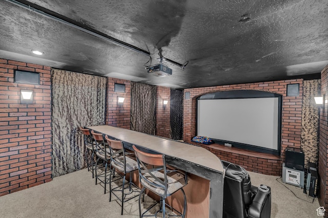 1060 E Summit Ridge Dr, St George, UT 84790 - cinema room featuring a dry bar, brick wall, carpet floors, and a textured ceiling