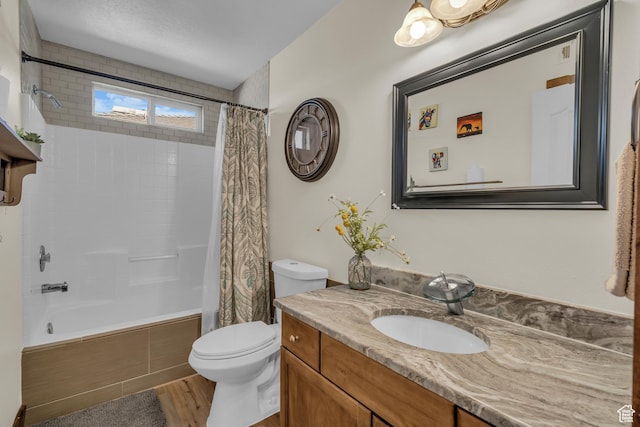 1060 E Summit Ridge Dr, St George, UT 84790 - bathroom with vanity, toilet, wood finished floors, and shower / tub combo