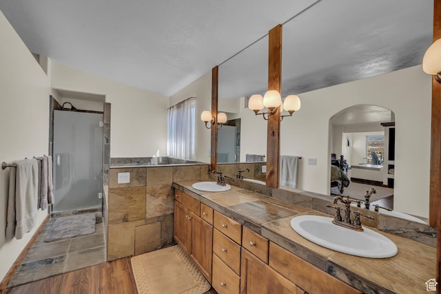 1060 E Summit Ridge Dr, St George, UT 84790 - ensuite bathroom with a sink, double vanity, ensuite bath, and a shower stall