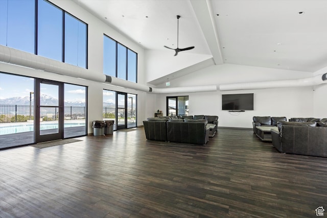 4823 W Mossley Dr, Herriman, UT 84096 - living room with dark wood-style floors, high vaulted ceiling, and beamed ceiling