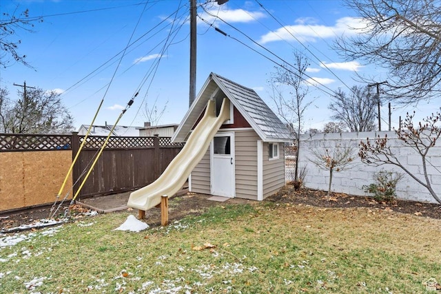 view of shed featuring a fenced backyard