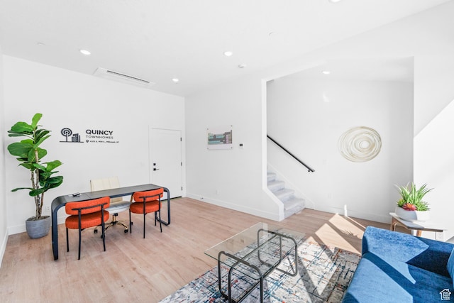4386 S 900 E Unit 102, Millcreek, UT 84124 - living area featuring stairway, light wood-type flooring, recessed lighting, and baseboards