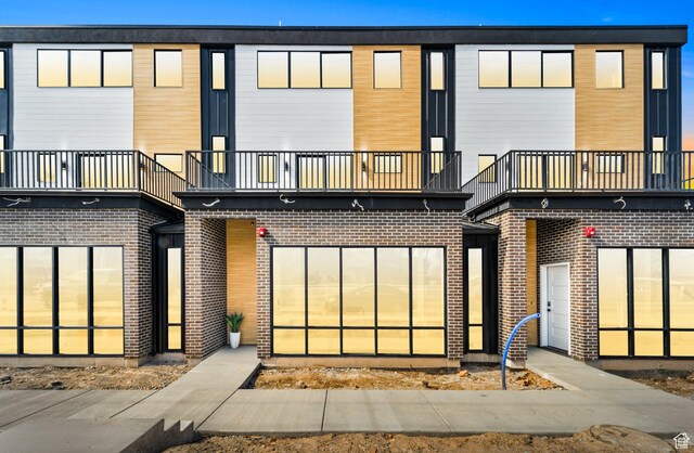 4386 S 900 E Unit 101, Millcreek, UT 84124 - exterior space featuring a balcony and brick siding
