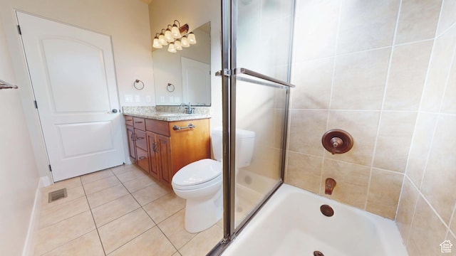 full bathroom featuring tile patterned floors, visible vents, toilet, and vanity