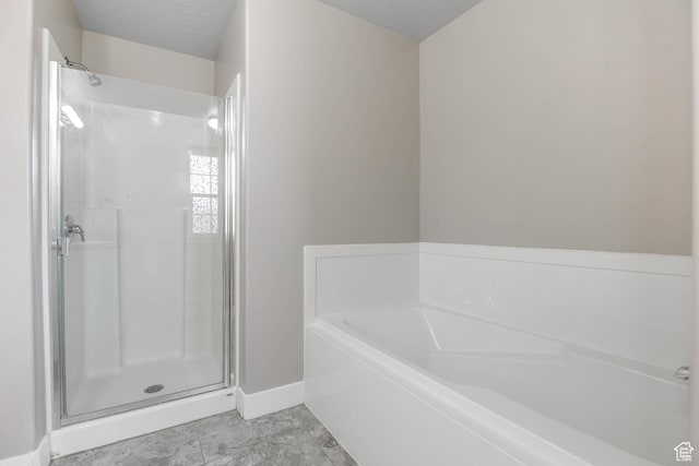 1848 E American Way Unit 2, Eagle Mountain, UT 84005 - full bathroom with a stall shower, baseboards, and a bath