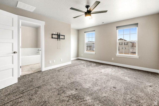 1848 E American Way Unit 2, Eagle Mountain, UT 84005 - unfurnished bedroom with carpet flooring, baseboards, ensuite bath, and ceiling fan