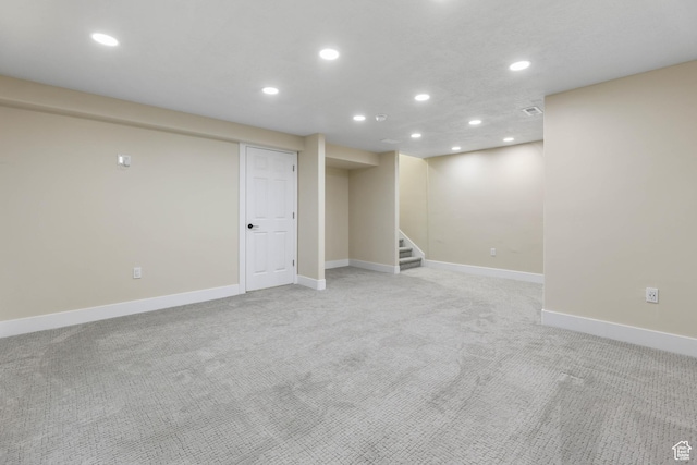 1848 E American Way Unit 2, Eagle Mountain, UT 84005 - finished basement with recessed lighting, light carpet, baseboards, and stairway