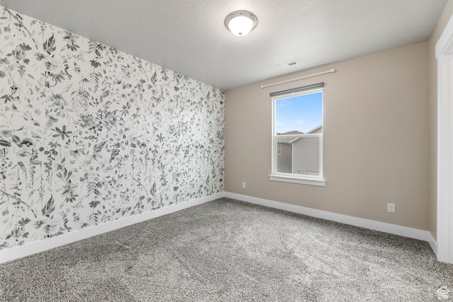 1848 E American Way Unit 2, Eagle Mountain, UT 84005 - unfurnished room featuring carpet floors, wallpapered walls, and baseboards