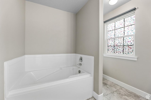 1848 E American Way Unit 2, Eagle Mountain, UT 84005 - full bathroom with baseboards and a bath