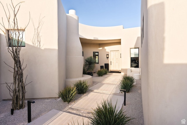 exterior space featuring stucco siding