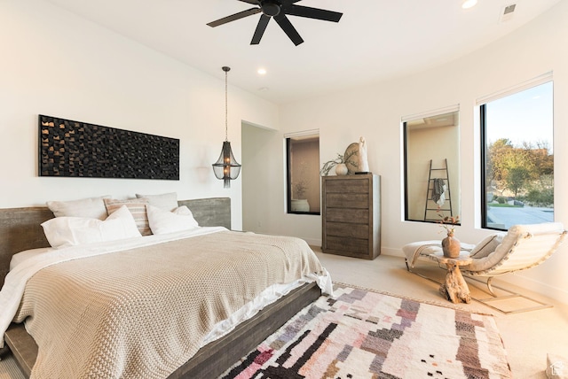 carpeted bedroom with recessed lighting, baseboards, and ceiling fan