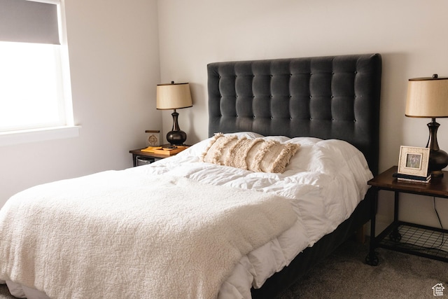 bedroom featuring carpet