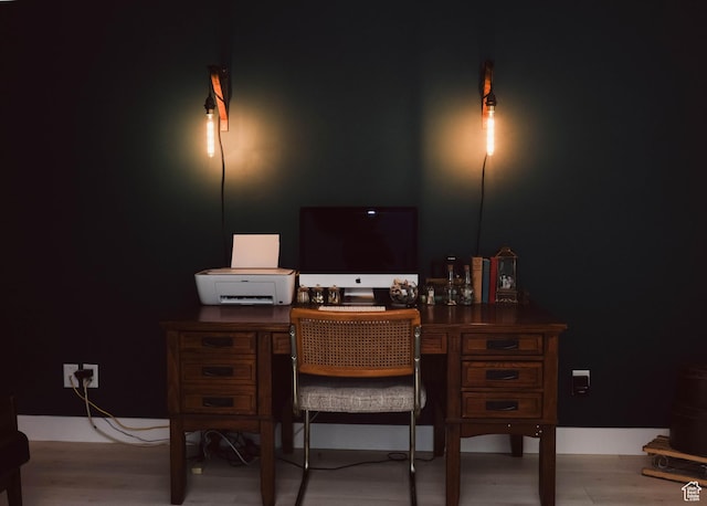 office space featuring wood finished floors