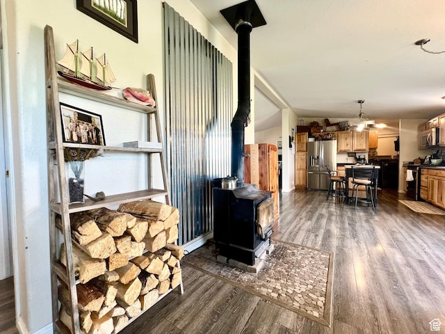 1568 N 750 E, Vernal, UT 84078 - living area featuring dark wood-type flooring and a wood stove