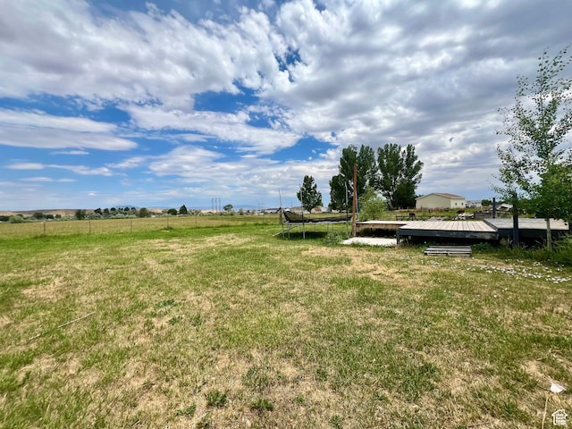 1568 N 750 E, Vernal, UT 84078 - view of yard featuring fence, a trampoline, and a rural view