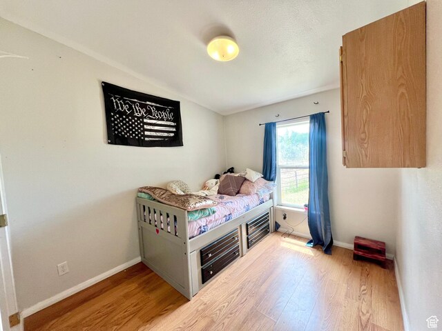 1568 N 750 E, Vernal, UT 84078 - bedroom featuring wood finished floors and baseboards