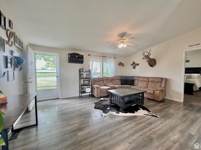 1568 N 750 E, Vernal, UT 84078 - living area with visible vents, baseboards, wood finished floors, and a ceiling fan