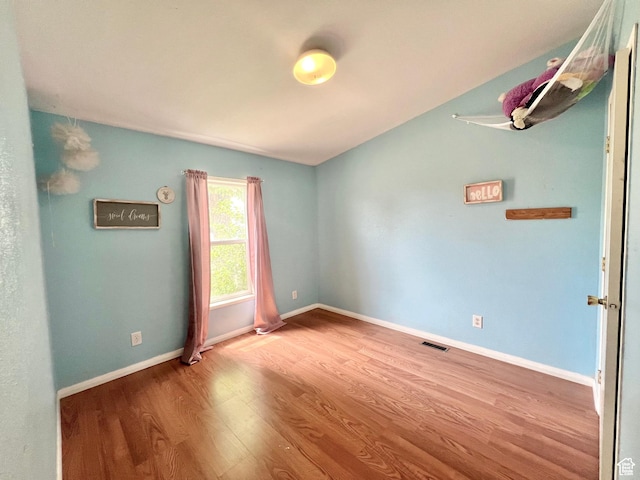 1568 N 750 E, Vernal, UT 84078 - empty room featuring visible vents, baseboards, and wood finished floors