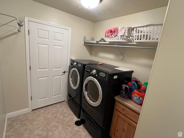 188 S 1970 W Unit L4, Lehi, UT 84043 - clothes washing area featuring a textured ceiling, laundry area, and washing machine and clothes dryer