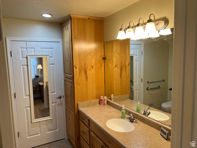 188 S 1970 W Unit L4, Lehi, UT 84043 - bathroom with a textured ceiling, vanity, and toilet