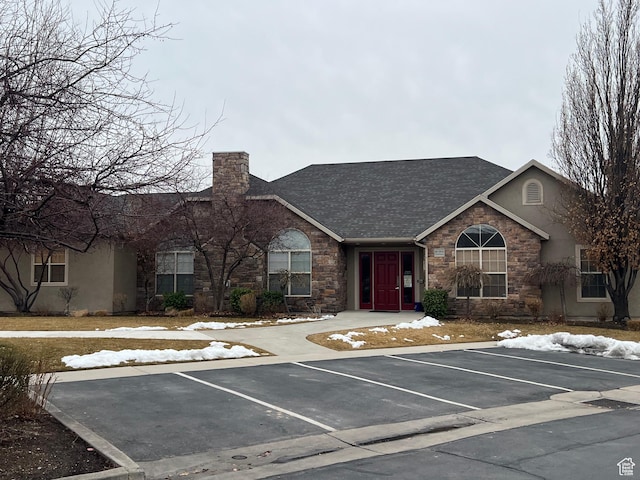 188 S 1970 W Unit L4, Lehi, UT 84043 - ranch-style home featuring stucco siding, stone siding, roof with shingles, and uncovered parking