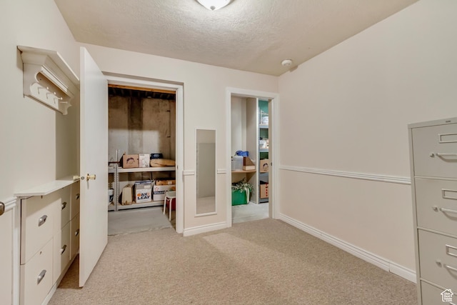92 W Centerville Commons Way, Centerville, UT 84014 - bedroom with light colored carpet, a textured ceiling, and baseboards