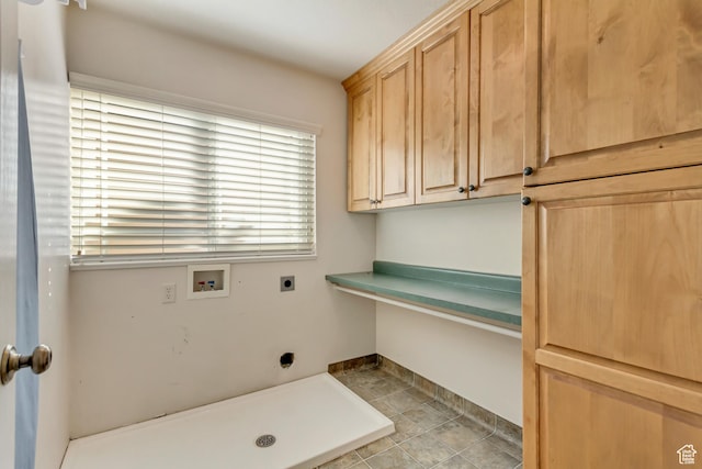 92 W Centerville Commons Way, Centerville, UT 84014 - laundry area featuring electric dryer hookup, cabinet space, hookup for a washing machine, and light tile patterned floors