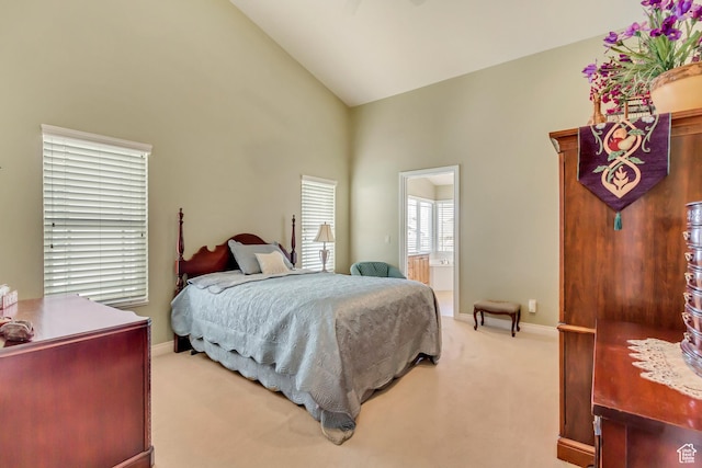 92 W Centerville Commons Way, Centerville, UT 84014 - bedroom featuring ensuite bath, light colored carpet, baseboards, and high vaulted ceiling