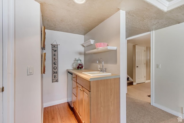 92 W Centerville Commons Way, Centerville, UT 84014 - bathroom with baseboards, vanity, vaulted ceiling, wood finished floors, and a textured ceiling