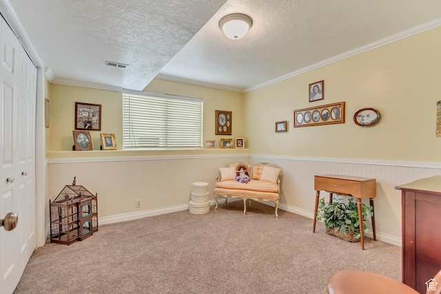 92 W Centerville Commons Way, Centerville, UT 84014 - living area with carpet flooring, a textured ceiling, visible vents, and ornamental molding