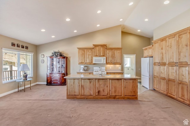 92 W Centerville Commons Way, Centerville, UT 84014 - kitchen with white appliances, light carpet, light brown cabinets, and a sink