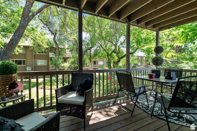 1333 S Lorl Ln E Unit 6, Ogden, UT 84404 - wooden deck with outdoor dining space