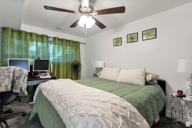 1333 S Lorl Ln E Unit 6, Ogden, UT 84404 - bedroom featuring visible vents, carpet, and ceiling fan