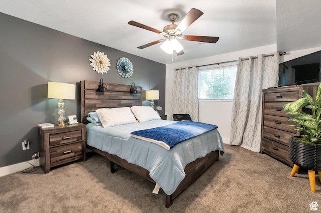 1333 S Lorl Ln E Unit 6, Ogden, UT 84404 - bedroom featuring baseboards, a ceiling fan, and carpet floors